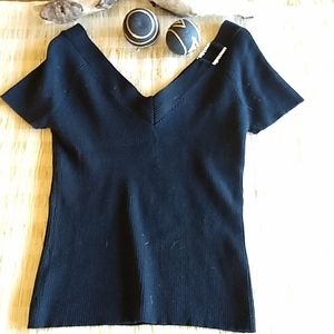 Black top with diamond neck detail